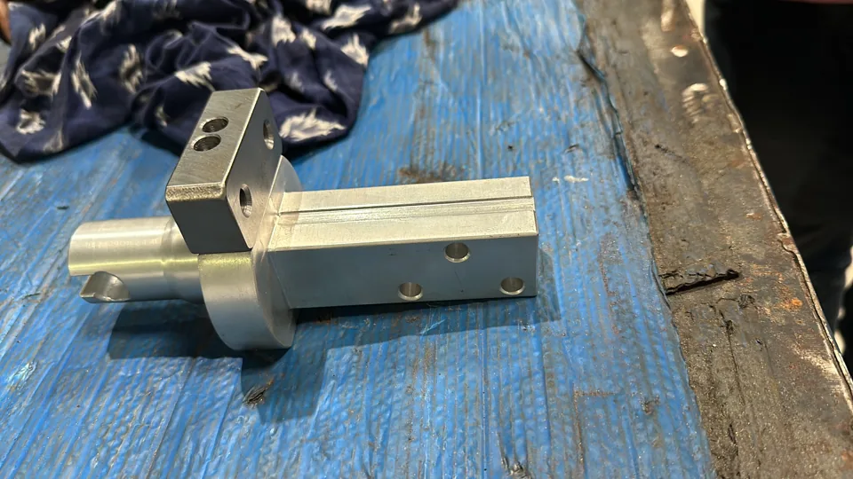 Separate machined tooling component; identity and supply role pending confirmation