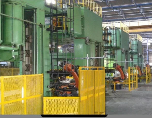 Robotic press-line installation shown in supplied presentation slide 8; project, customer and site association pending confirmation Robotic press-line installation shown in supplied presentation slide 8; project, customer and site association pending confirmation